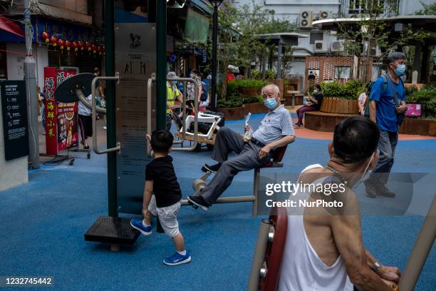 An Elderly man wearing a face mask Exercise in a park in Hong Kong, China, on May 6, 2021.