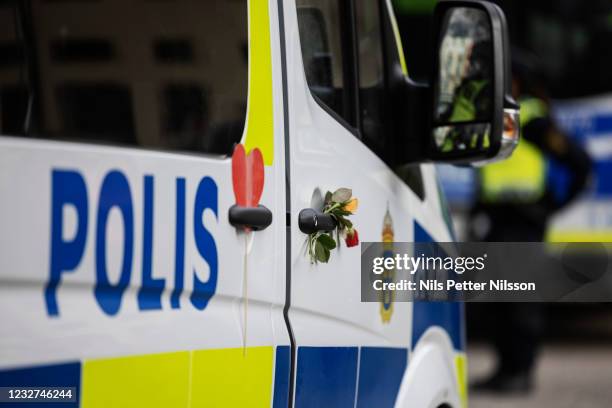 Police car with flowers during an illegal protest against lockdowns and restrictions regarding the ongoing COVID-19 pandemic on May 1, 2021 in...