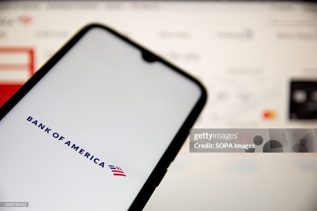 In this photo illustration a Bank of America logo seen...