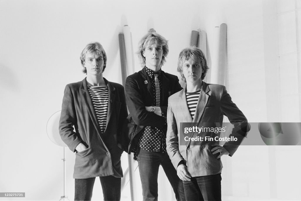 The Police British Rock Band Pose For A Group Studio Portrait the-police-british-rock-band-pose-for-a-group-studio-portrait