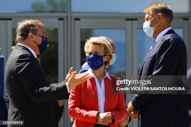 European Commission President Ursula von der Leyen flanked by Romania's President Klaus Werner Iohannis and Sweden's Prime Minister Stefan Lofven...