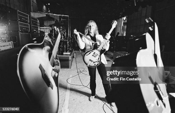 Alex Lifeson, guitarist with Canadian rock band Rush, poses during a soundcheck ahead of the band's gig at Shepperton Studios in Shepperton, Surrey,...