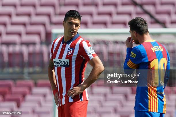 Luis Suarez of Atletico Madrid and Lionel Messi of Barcelona wlaks prior to the La Liga Santander match between FC Barcelona and Atletico de Madrid...