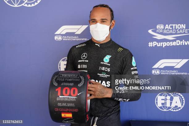Mercedes' British driver Lewis Hamilton poses after the qualifying session at the Circuit de Catalunya on May 8, 2021 in Montmelo on the outskirts of...