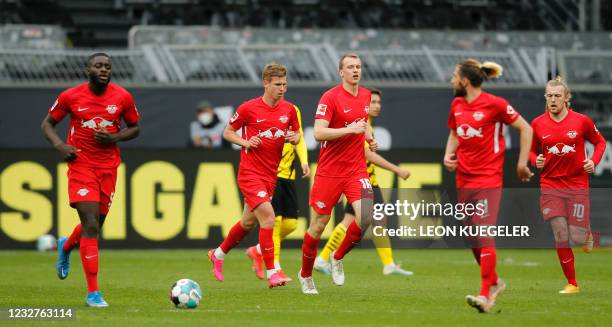 Leipzig's German defender Lukas Klostermann celebrates with teammates after scoring the 2-1 during the German first division Bundesliga football...