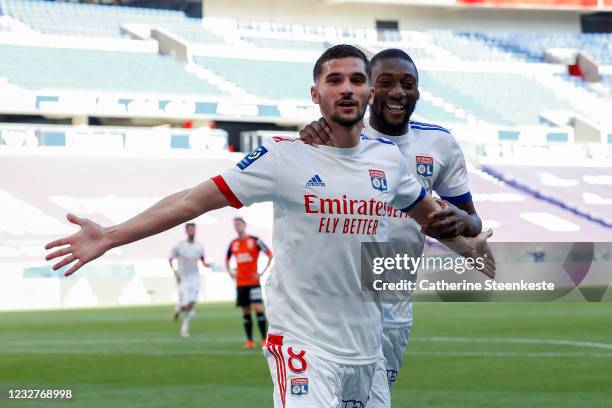 Houssem Aouar of Olympique Lyonnais celebrates his goal with Karl Toko Ekambi of Olympique Lyonnais during the Ligue 1 match between Olympique...