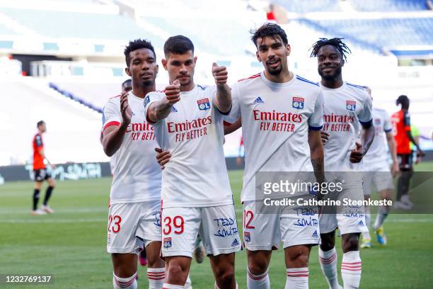 Bruno Guimaraes of Olympique Lyonnais celebrates his goal with Lucas Paqueta and his teammates of Olympique Lyonnais during the Ligue 1 match between...