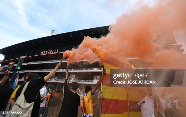 Valencia CF fans take part in a protest against the management of Singaporean Business magnate and owner of the club, Peter Lim, outside the Mestalla...