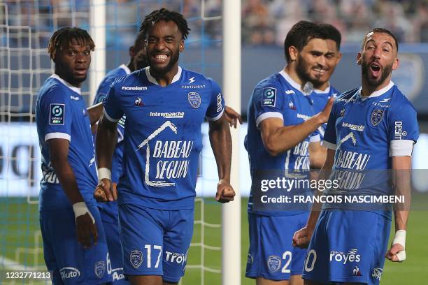 Troyes' teammates celebrate after Troyes' forward Dylan Saint-Louis scored a goal during the French Ligue 2 football match between Troyes and...