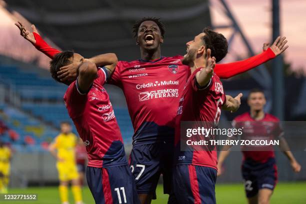Clermont's Gabonese forward Jim Allevinah celebrates after scoring during the French Ligue 2 football match Clermont versus Sochaux at the Gabriel...