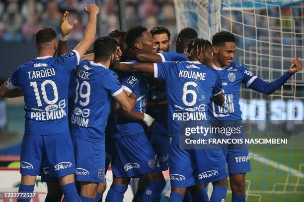 Troyes' Congolese forward Dylan Saint-Louis celebrates with teammates after scoring during the French Ligue 2 football match between Troyes and...