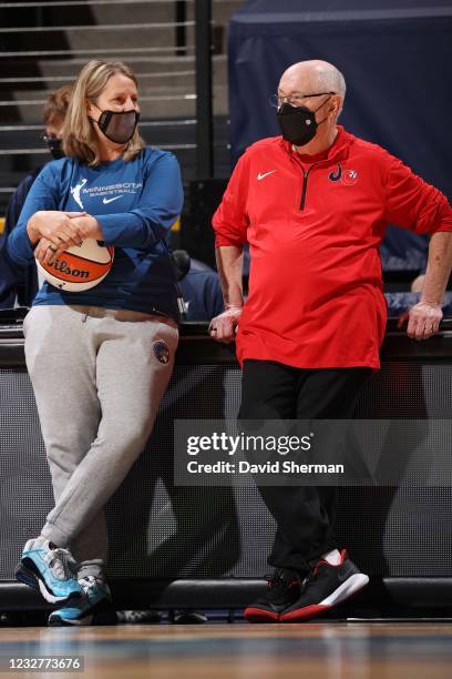 Head Coach Cheryl Reeve of the Minnesota Lynx talks with Head Coach Mike Thibaulton of the Washington Mystics on May 8, 2021 at Target Center in...