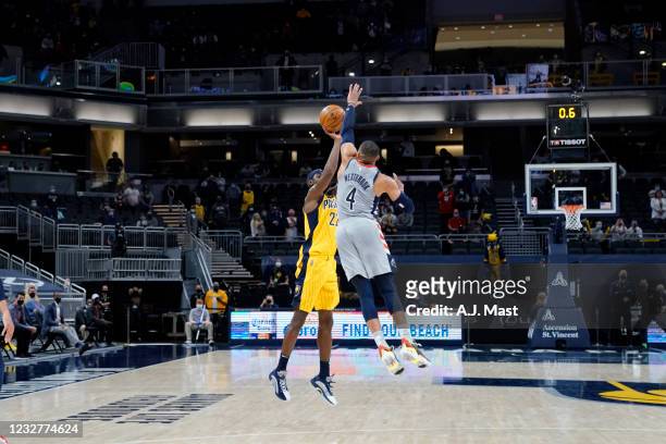 Russell Westbrook of the Washington Wizards blocks a shot to win the game against the Indiana Pacers on May 8, 2021 at Bankers Life Fieldhouse in...