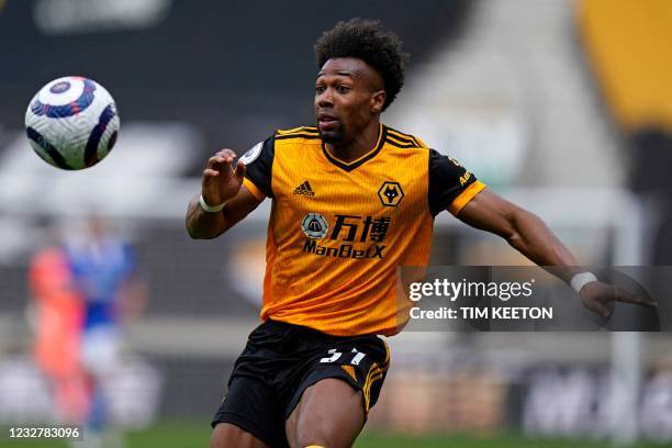 Wolverhampton Wanderers' Spanish midfielder Adama Traore controls the ball during the English Premier League football match between Wolverhampton...