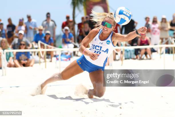 Jaden Whitmarsh of the UCLA Bruins dives for the ball against the USC Trojans during the Division I Women's Beach Volleyball Championship held at the...