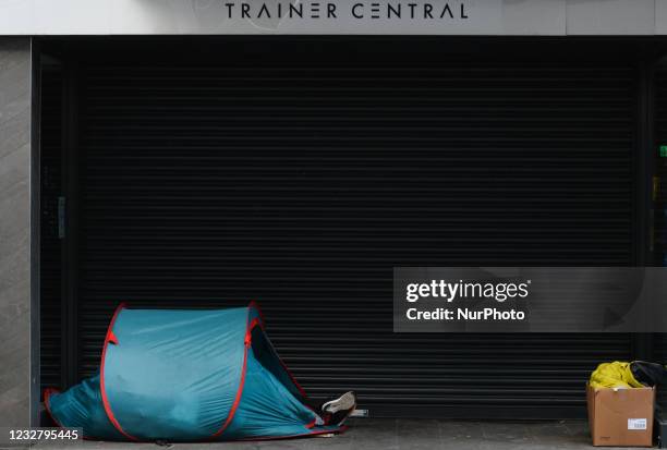 View of a rough sleeper's tent at the entrance to a closed shop on Henry Street in Dublin city center during the final days of the level five...