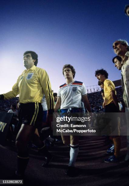 England goalkeeper Peter Shilton and teammate Tony Woodcock returning for the second half of the UEFA Euro 1980 Group 2 match between England and...