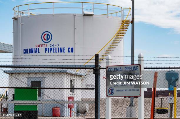 Fuel tanks are seen at Colonial Pipeline Baltimore Delivery in Baltimore, Maryland on May 10, 2021. - The US government declared a regional emergency...