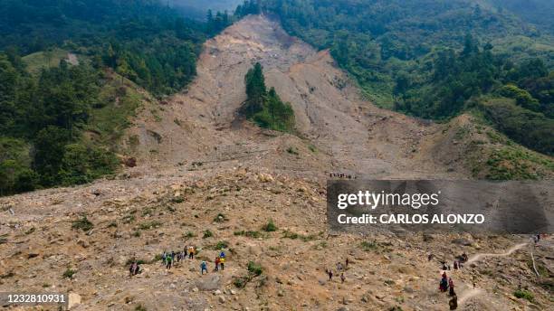 This photo taken on May 1 shows an aerial view of the Guatemalan village of Queja, San Cristobal Verapaz municipality, Alta Verapaz department, which...