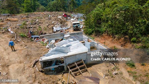 This photo taken on May 1 shows an aerial view of the Guatemalan village of Queja, San Cristobal Verapaz municipality, Alta Verapaz department, which...
