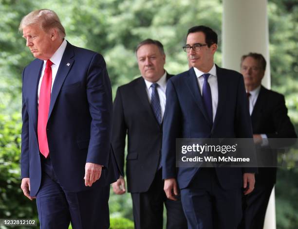 President Donald Trump walks into the Rose Garden to make a statement about U.S. Relations with China, at the White House May 29, 2020 in Washington,...