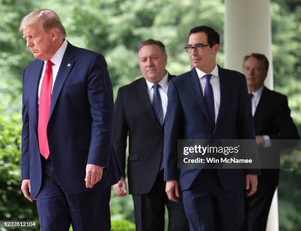 President Donald Trump walks into the Rose Garden to make a statement about U.S. Relations with China, at the White House May 29, 2020 in Washington,...