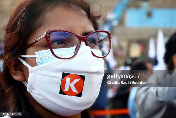 Supporter of presidential candidate of Fuerza Popular party Keiko Fujimori looks on during an event at Asentamiento Pomacocha-Manolo Castillo in...