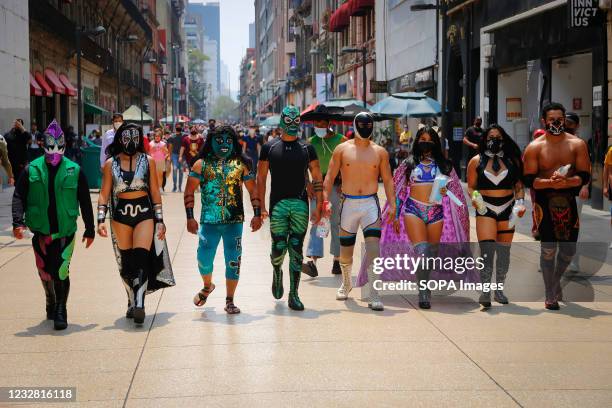 Mexican Luchadores walk on Madero Street. "The Brigade two of three falls" called by the Mexican City Youth Institute made a round of Madero Street...