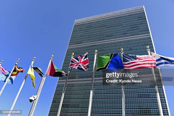 National flags fly at the United Nations headquarters in New York on April 6, 2021.