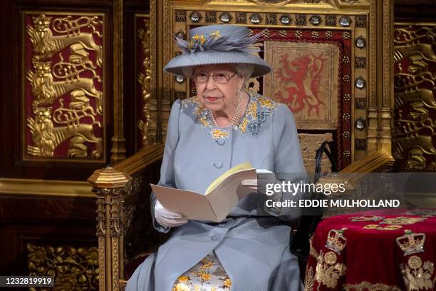 Britain's Queen Elizabeth II reads the Queen's Speech on the The Sovereign's Throne in the House of Lords chamber,, during the State Opening of...