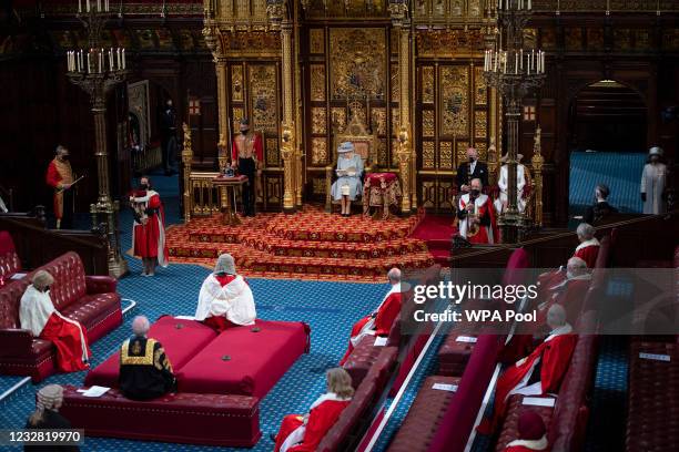 Queen Elizabeth II delivers the Queen's Speech in the House of Lord's Chamber with Prince Charles, Prince of Wales and Camilla, Duchess of Cornwall...