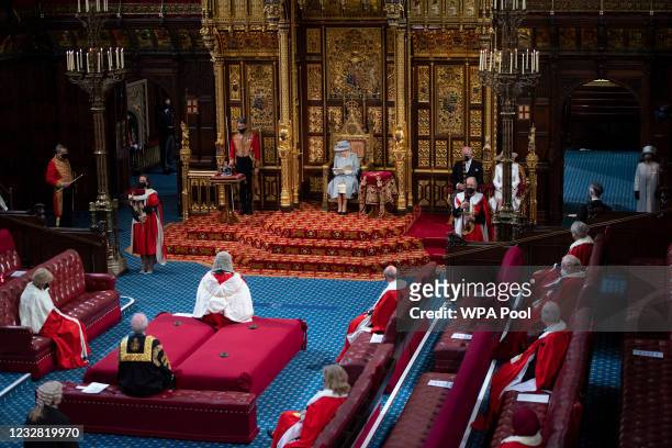 Queen Elizabeth II delivers the Queen's Speech in the House of Lord's Chamber with Prince Charles, Prince of Wales and Camilla, Duchess of Cornwall...