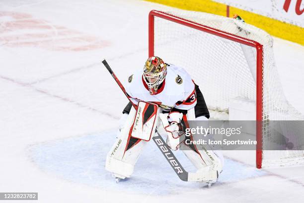 Ottawa Senators Goalie Anton Forsberg gets set for a faceoff during the first period of an NHL game where the Calgary Flames hosted the Ottawa...