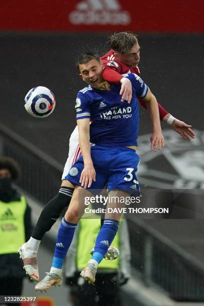 Leicester City's English defender Luke Thomas vies with Manchester United's English defender Brandon Williams during the English Premier League...