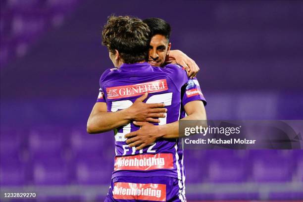 Manprit Sakaria of Austria Wien and Dominik Fitz of Austria Wien celebrate their game winning goal during the tipico Bundesliga match between FK...