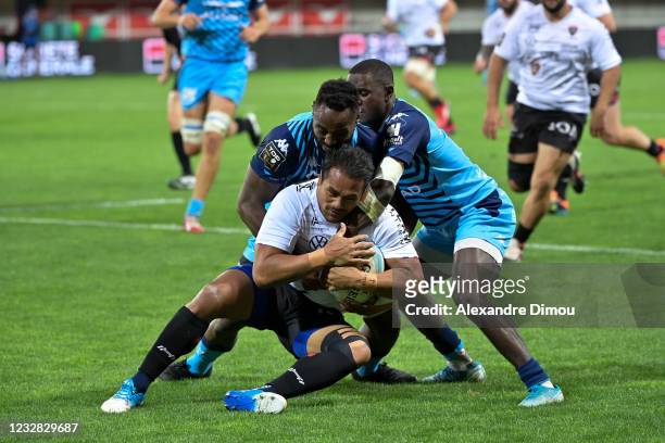 Isaia TOEAVA of Toulon and Gabriel NGANDEBE of Montpellier and Fulgence OUEDRAOGO of Montpellier during the Top 14 match between Montpellier and...
