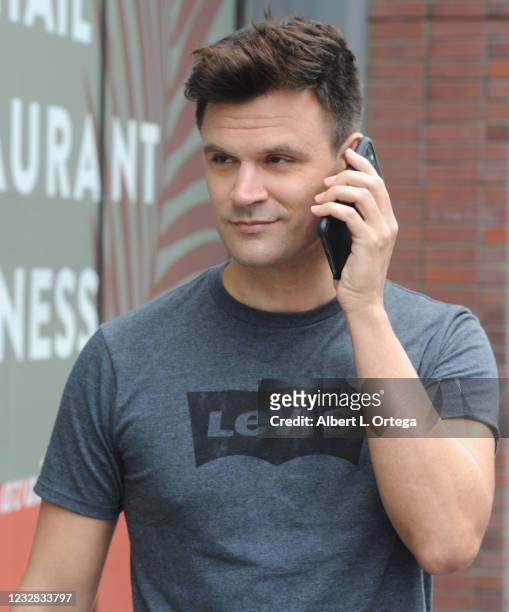 Actor Kash Hovey walks the streets of Hollywood after shopping at Amoeba on May 11, 2021 in Los Angeles, California.