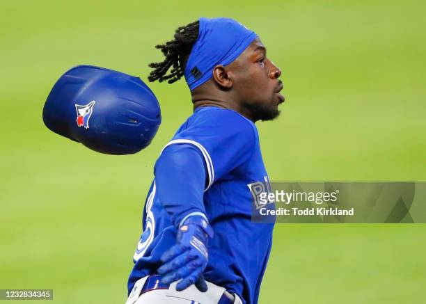 Jonathan Davis of the Toronto Blue Jays races to second base after hitting a double in the eighth inning against the Atlanta Braves at Truist Park on...