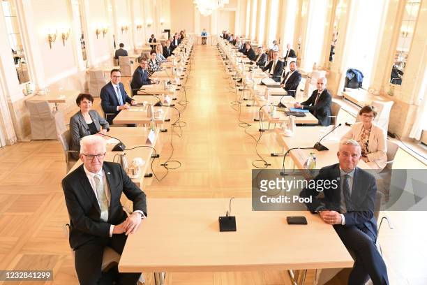 Winfried Kretschmann , Prime Minister of Baden-Wuerttemberg and Thomas Strobl , Minister of the Interior of Baden-Wuerttemberg, sit in the first...