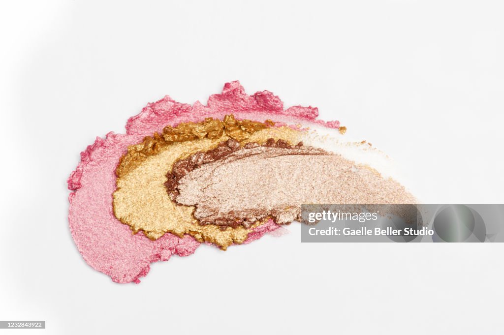 Creamy Eyeshadows Smeared on White Background