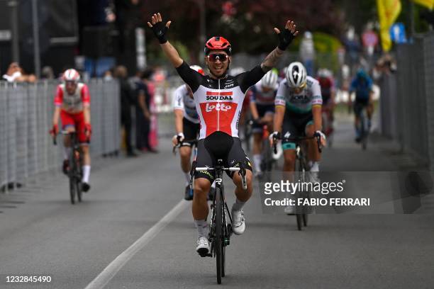 Team Lotto-Soudal rider Australia's Caleb Ewan celebrates on the finish line after winning the fifth stage of the Giro d'Italia 2021 cycling race,...