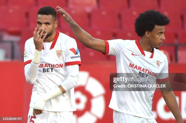 Sevilla's Moroccan forward Youssef En-Nesyri celebrates after scoring a goal with Sevilla's French defender Jules Kounde during the Spanish league...