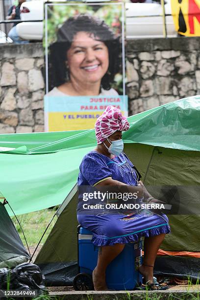 Garifuna woman remains in an encampment in front of the Supreme Court of Justice to demand a conviction during the oral and public trial against the...