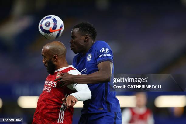 Arsenal's French striker Alexandre Lacazette vies with Chelsea's French defender Kurt Zoumaduring the English Premier League football match between...