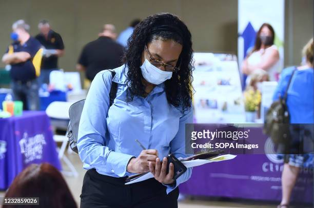 Woman seeking employment attends the 25th annual Central Florida Employment Council Job Fair at the Central Florida Fairgrounds. More than 80...