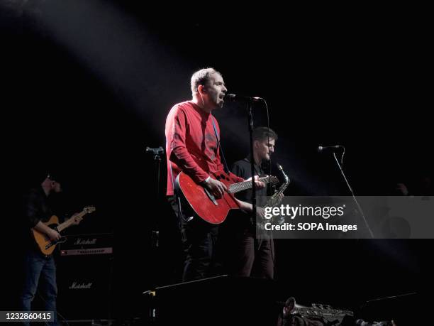 Konstantin Semin in the center performs a song with a guitar. Concert of the rock group Gianni Rodari, journalist, documentary filmmaker and public...