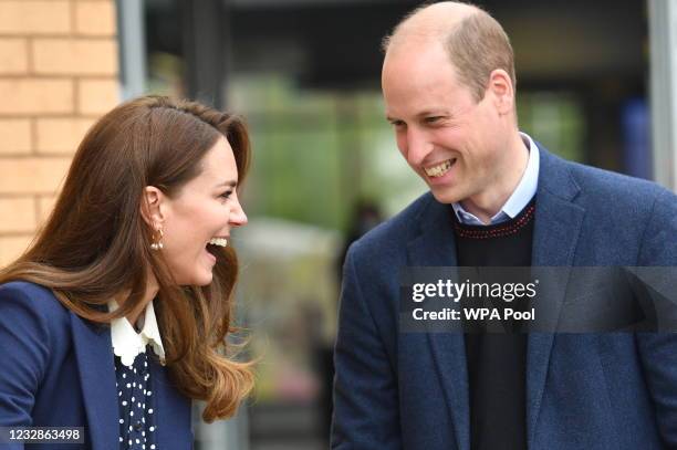 Prince William, Duke of Cambridge and Catherine, Duchess of Cambridge take part in a gardening session during a visit to The Way Youth Zone on May...