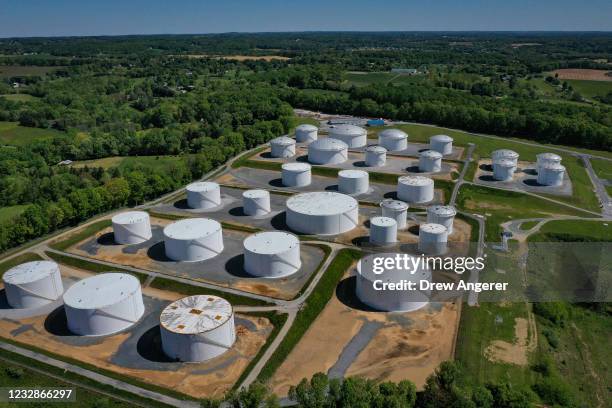 In an aerial view, fuel holding tanks are seen at Colonial Pipeline's Dorsey Junction Station on May 13, 2021 in Woodbine, Maryland. The Colonial...