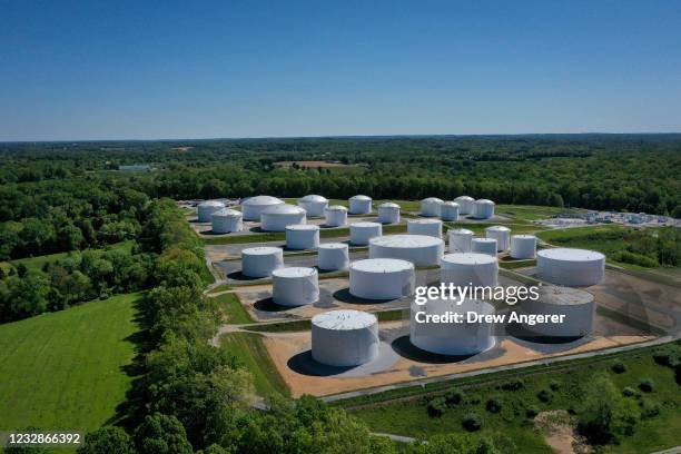 In an aerial view, fuel holding tanks are seen at Colonial Pipeline's Dorsey Junction Station on May 13, 2021 in Woodbine, Maryland. The Colonial...