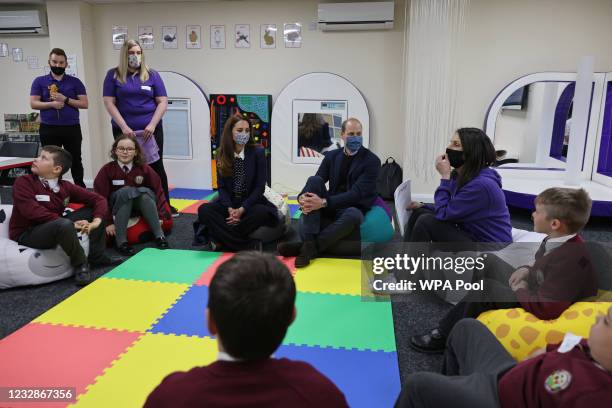 Prince William, Duke of Cambridge and Catherine, Duchess of Cambridge join a group of local school children from Loxdale Primary School during a...